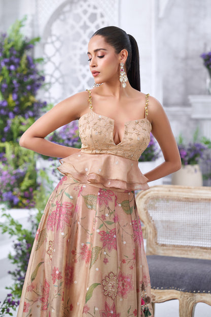 Rose Gold Peplum Embellished Blouse with Floral Printed Lehenga Skirt