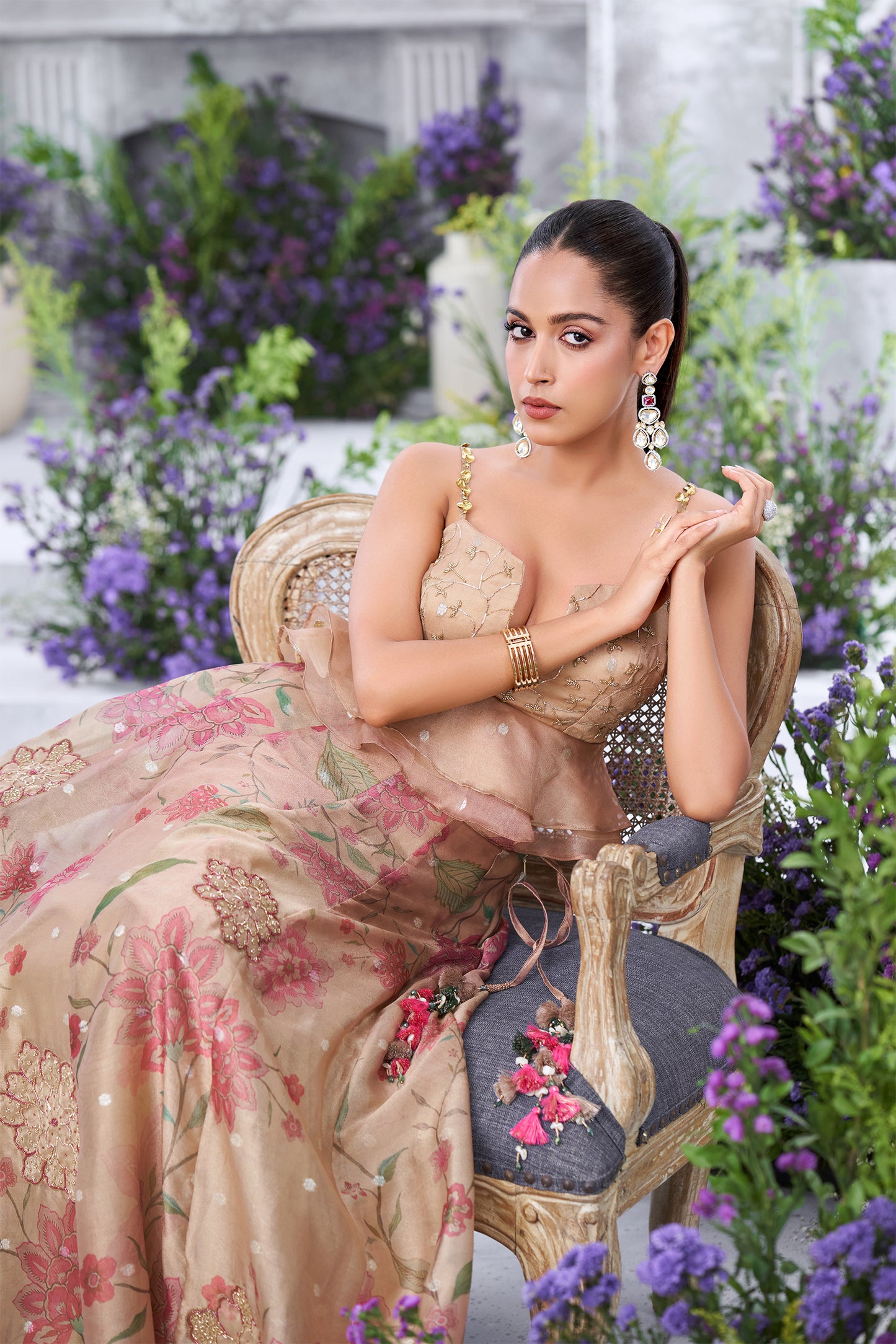 Rose Gold Peplum Embellished Blouse with Floral Printed Lehenga Skirt