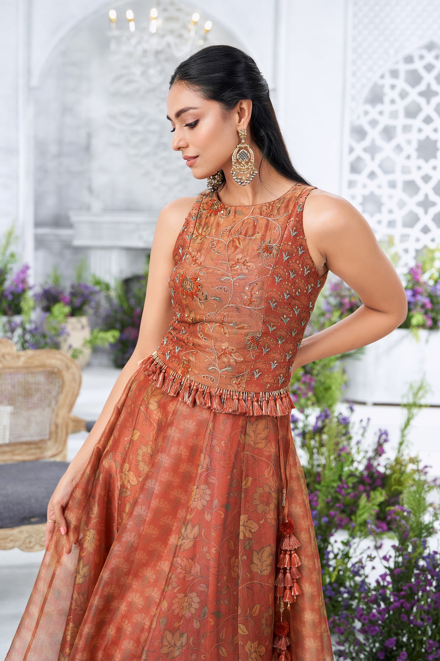Rust Orange Embroidered Sleeveless Peplum Top with Floral Printed Kalidar Skirt