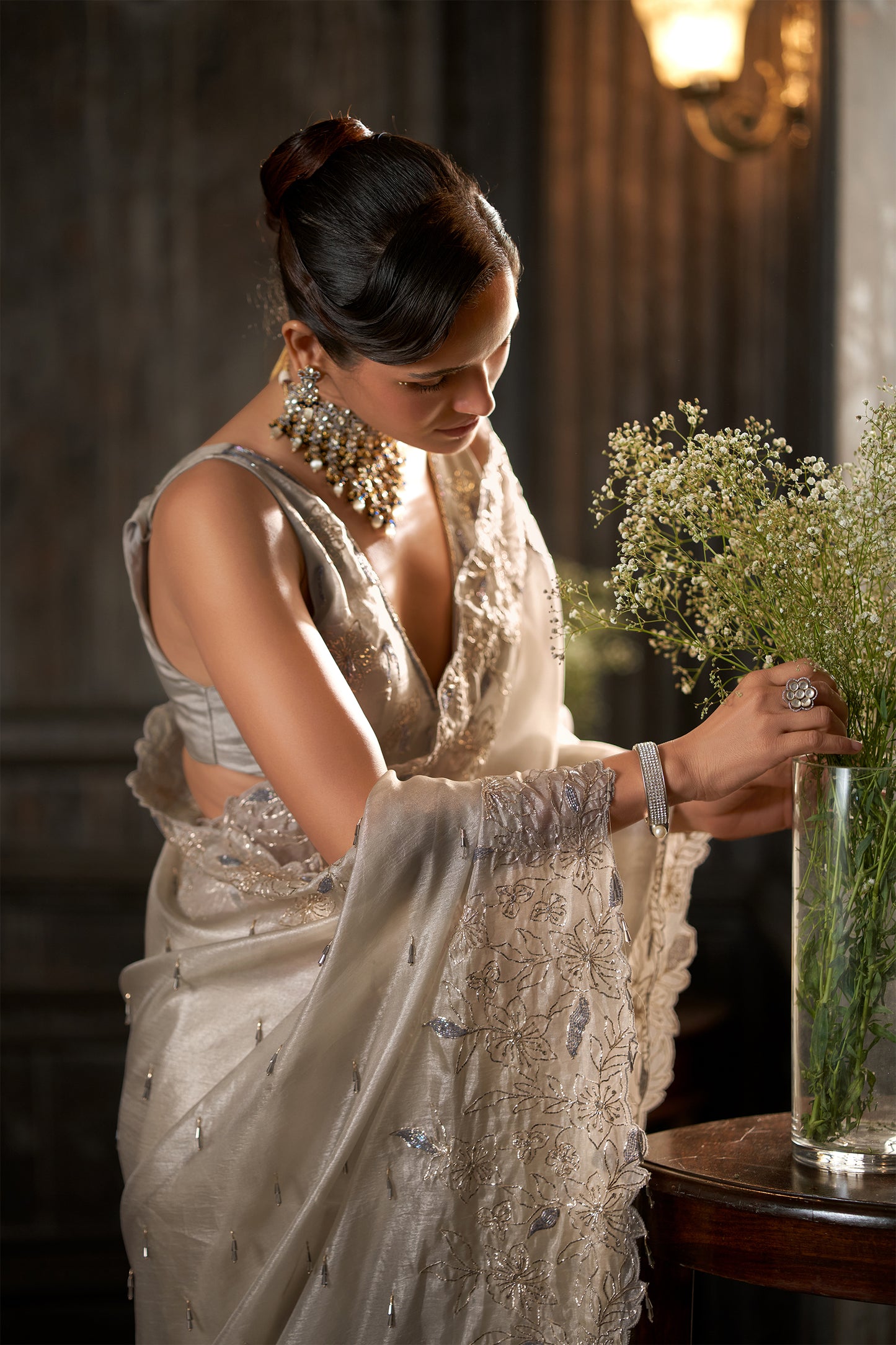 Silver-White Embellished Saree with hand work Border and Embroidered Blouse