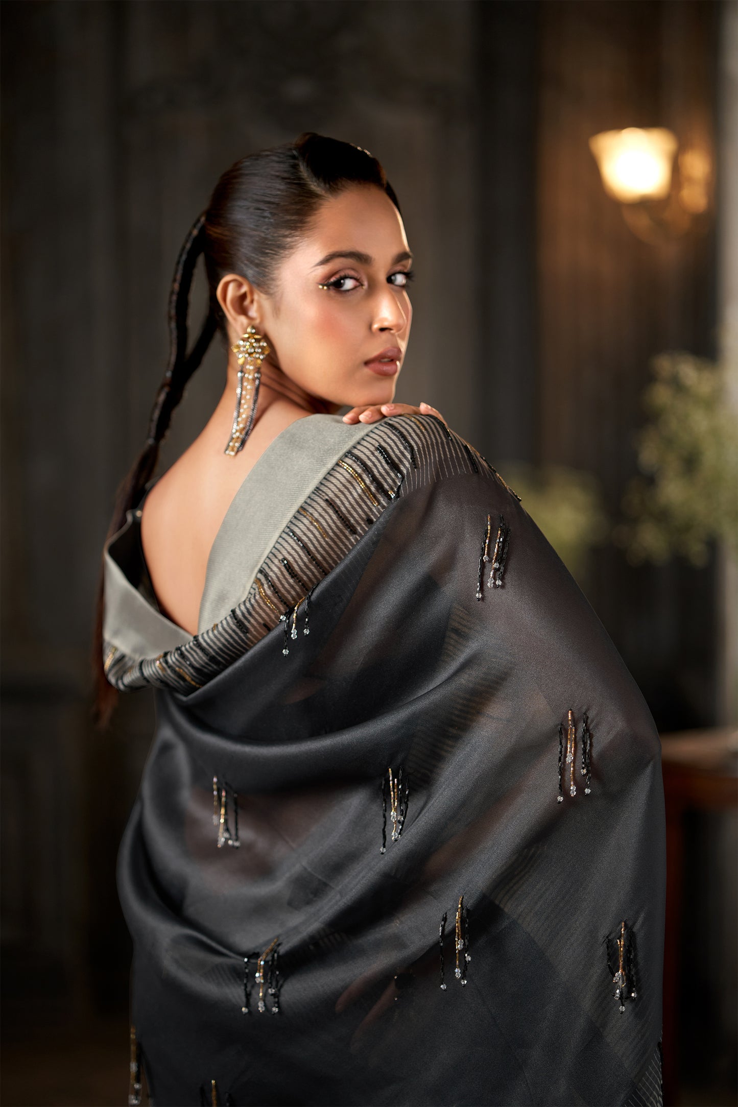 Metallic Black Embellished Saree with Silver Border and Tasselled  Blouse