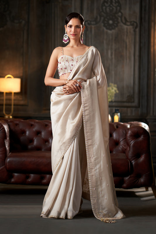 Off-White Saree with Zari Border and Beaded bustier Blouse