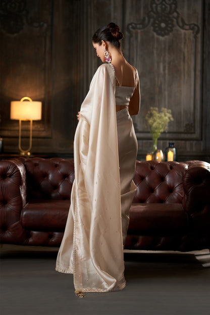 Off-White Saree with Zari Border and Beaded bustier Blouse