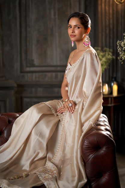 Off-White Saree with Zari Border and Beaded bustier Blouse