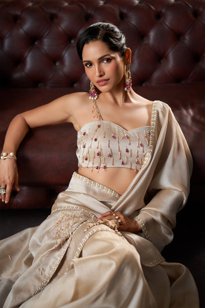 Off-White Saree with Zari Border and Beaded bustier Blouse