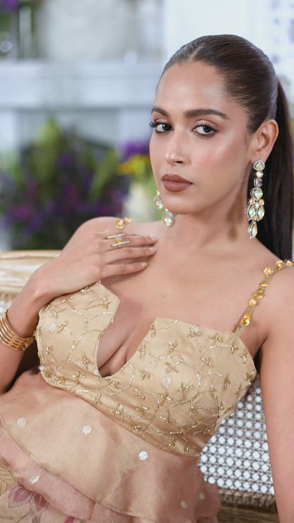Rose Gold Peplum Embellished Blouse with Floral Printed Lehenga Skirt
